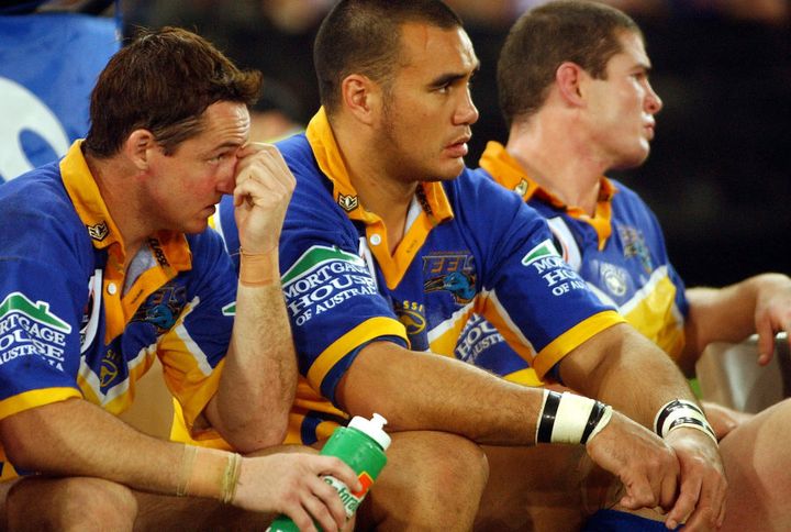 Well at least things got better for Jason Taylor (left), who went on from the disappointment of the 2001 grand final to a brilliant coaching career with the Wests Tigers... he wishes.