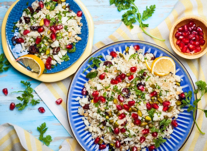 Try using cauliflower couscous with dried cranberry, pomegranate, pistachio and pine nut salad.