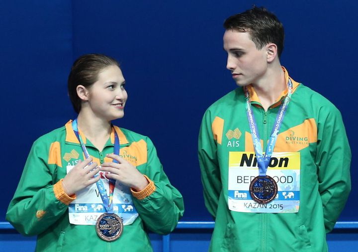 Even their expressions were in unison after Melissa Wu and Domonic won bronze in the 10m platform mixed synchronised event at the 2015 FINA World Championships.