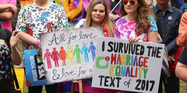 People show their support at the YES March for Marriage Equality on October 21, 2017 in Sydney, Australia.