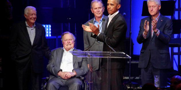 Five former U.S. presidents, Jimmy Carter, George H.W. Bush, George W. Bush, Barack Obama and Bill Clintonspeak during a concert at Texas A&M University benefiting hurricane relief efforts in College Station, Texas, U.S., October 21, 2017. REUTERS/Richard Carson