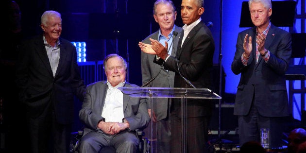 Five former U.S. presidents, Jimmy Carter, George H.W. Bush, George W. Bush, Barack Obama and Bill Clintonspeak during a concert at Texas A&M University benefiting hurricane relief efforts in College Station, Texas, U.S., October 21, 2017. REUTERS/Richard Carson