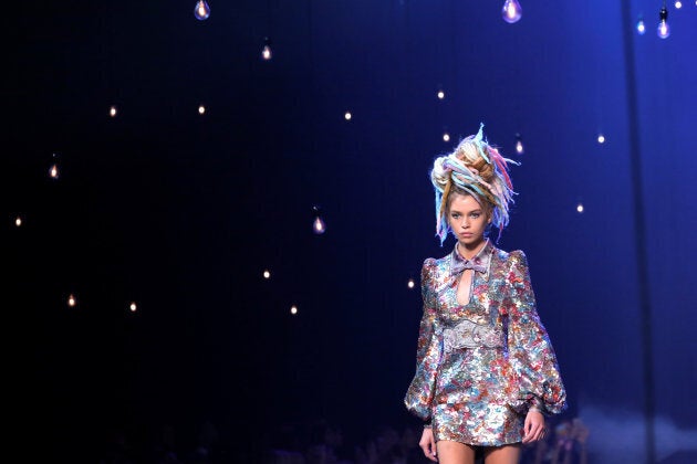 A model with fake dreadlocks walks down the catwalk at Marc Jacobs' controversial 2017 Spring show.