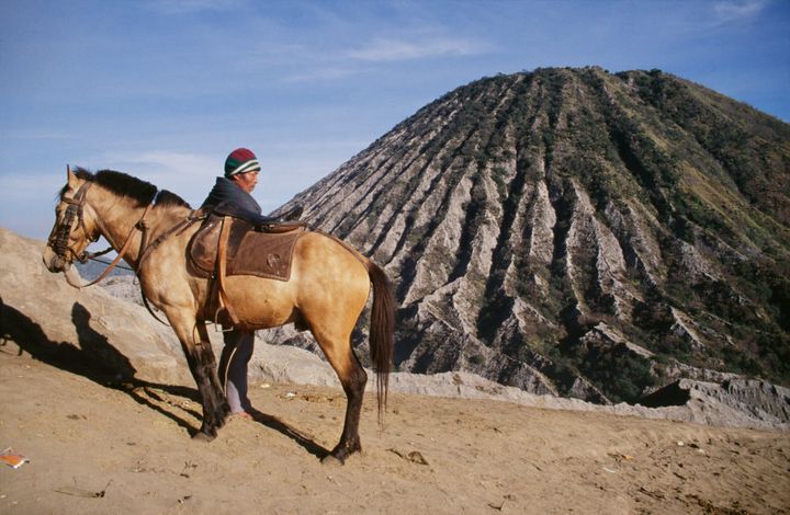 A horseman at Mount Bromo.