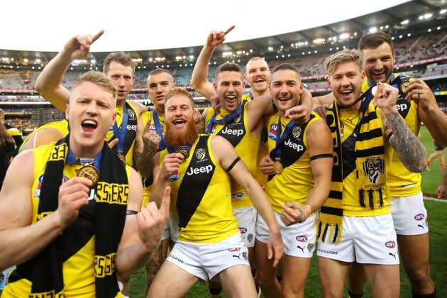 Tigers players celebrate winning the 2017 AFL Grand Final on September 30.