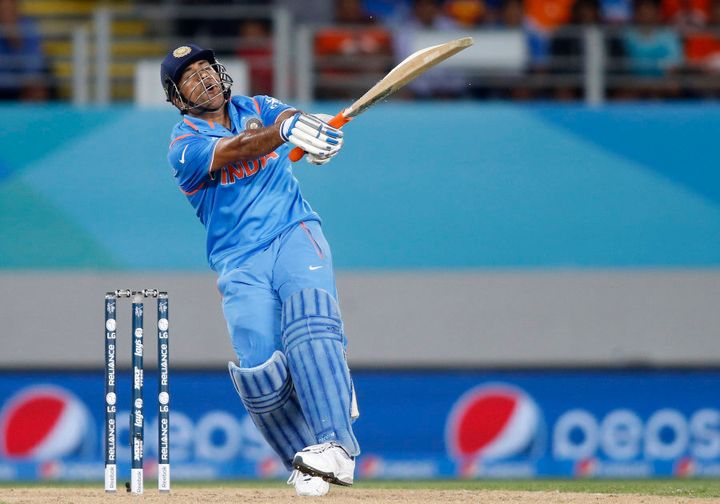 India's MS Dhoni swings his bat.