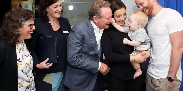 Andrew Forrest meets and plays peek-a-boo with Thomas, who was diagnosed with a brain tumour at four months of age.