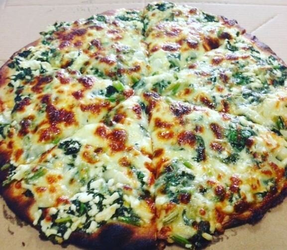 This is the spinach pizza. Gotta go. Need one now.