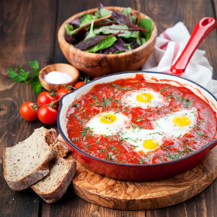 Shakshuka is a warming tomato dish baked with eggs and is perfect for dipping crusty toast into.