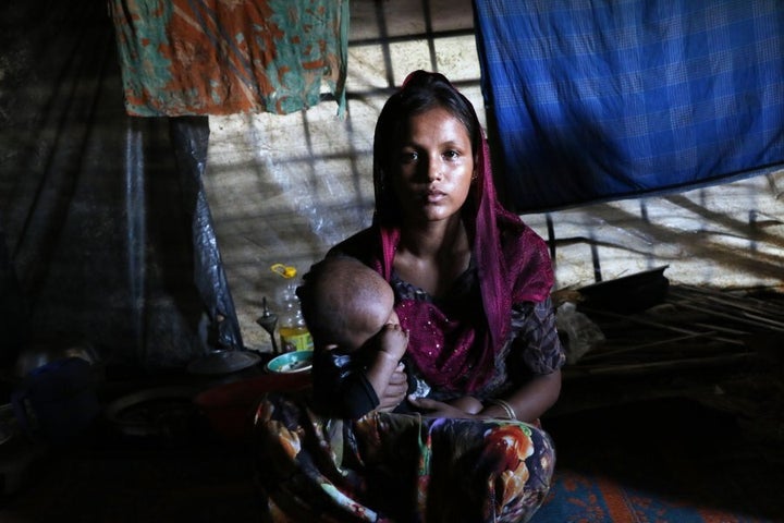 26-year-old Jamira, who lives in the neighborhood tents of Hasina with two children.