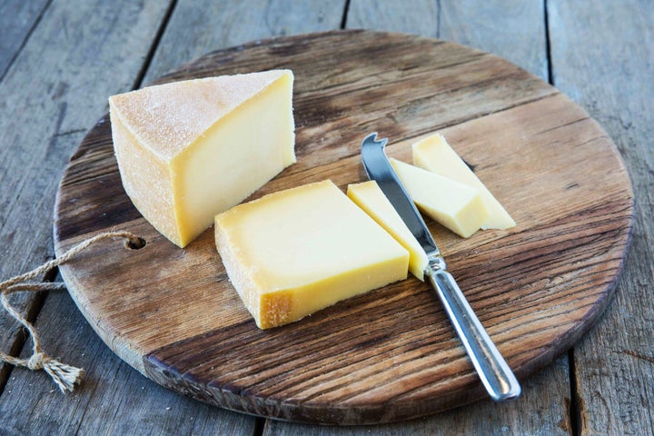 Heidi Farm's Tilsit cheese, a light yellow semi-hard, smear-ripened cheese.