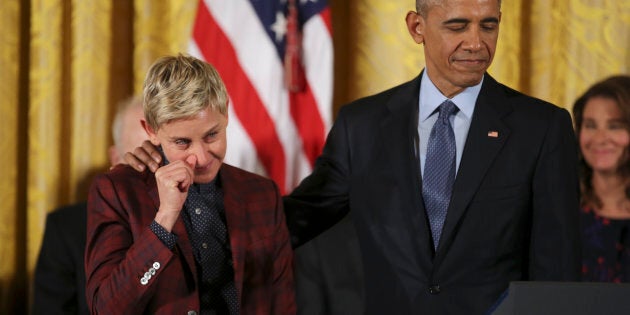 Comedian and talk show host Ellen DeGeneres wipes away a tear as she listens with U.S. President Barack Obama to her Presidential Medal of Freedom citation during a ceremony in the White House East Room in Washington, U.S., November 22, 2016. REUTERS/Carlos Barria