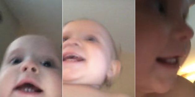 An adorable video captured a baby making off with a recording cell phone