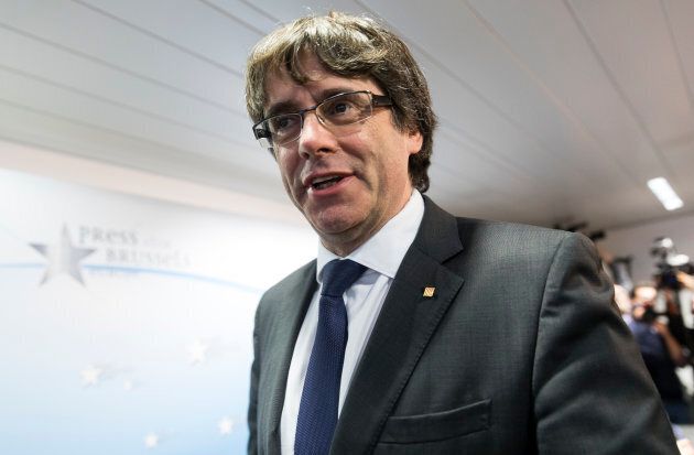 Dismissed Catalan regional President Carles Puigdemont has called for "democratic opposition".