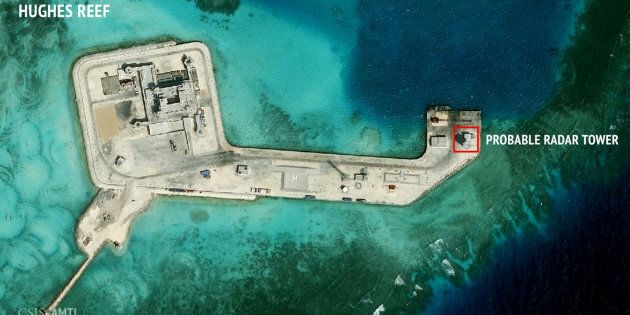 A satellite image released by the Asian Maritime Transparency Initiative at Washington's Center for Strategic and International Studies shows construction of possible radar tower facilities in the Spratly Islands in the disputed South China Sea.