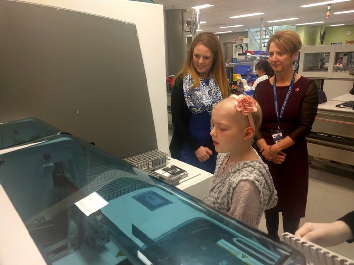 Bridgette with her mother Sharon and Dr Maxwell during their visit to Melbourne Pathology.