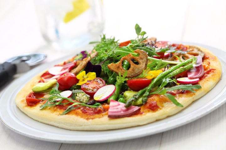 Pick a vegetarian pizza to boost the nutrition and veggie content.