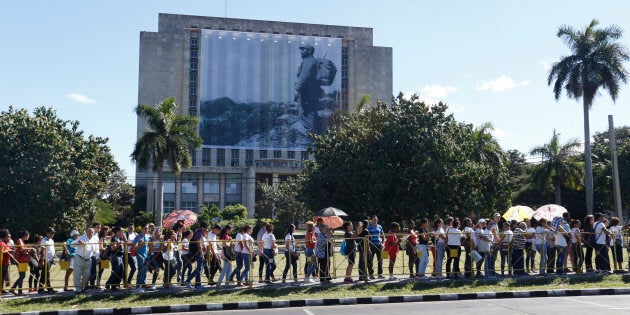 People wait in line to reach Revolution Square to pay tribute to Cuba's late President Fidel Castro in Havana, Cuba, November 28, 2016.