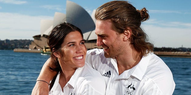 Rugby Sevens player Charlotte Caslick and her partner Lewis Holland pose  for a photograph at the 