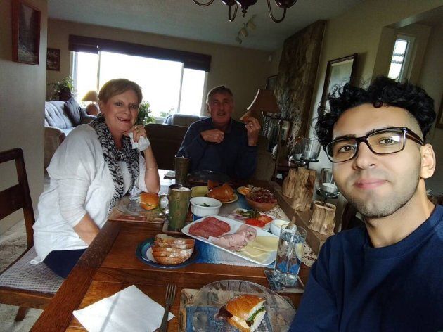 Amir enjoying a meal with the Taylors