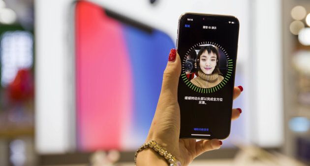 Setting up Face ID is easy. It scans your face while you draw an imaginary circle with your nose in the air a few times and you're ready to go.
