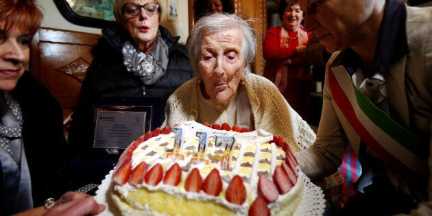 Emma Morano, thought to be the world's oldest person and the last to be born in the 1800s, blows candles during her 117th birthday in Verbania, northern Italy November 29, 2016. REUTERS/Alessandro Garofalo TPX IMAGES OF THE DAY