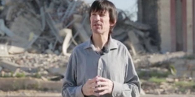 Pale and gaunt-looking British journalist John Cantlie, kidnapped in November 2012 by hardline rebels in Syria, appears in an Islamic State propaganda video released on July 12.