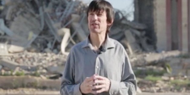 Pale and gaunt-looking British journalist John Cantlie, kidnapped in November 2012 by hardline rebels in Syria, appears in an Islamic State propaganda video released on July 12. 