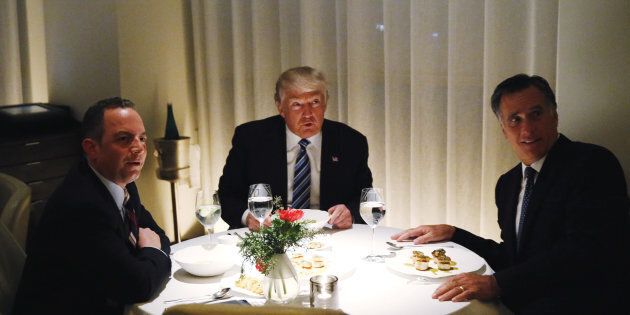 U.S. President-elect Donald Trump sits at a table for dinner with former Massachusetts Governor Mitt Romney (R) and his choice for White House Chief of Staff Reince Priebus (L) at Jean-Georges at the Trump International Hotel & Tower in New York, U.S., November 29, 2016. REUTERS/Lucas Jackson TPX IMAGES OF THE DAY