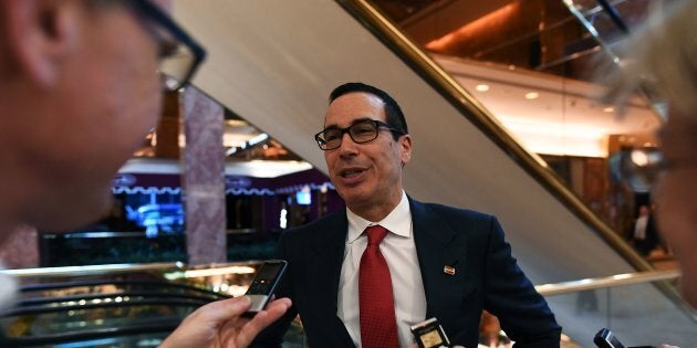 US President-elect Donald Trump adviser Steven Mnuchin speaks to reporters at the Trump Tower in New York on November 14, 2016. President-elect Donald Trump has vowed to move aggressively on a conservative agenda in filling Supreme Court vacancies, cracking down on immigration and cutting taxes, but also sought to reassure worried Americans they have nothing to fear from his presidency. / AFP / Jewel SAMAD (Photo credit should read JEWEL SAMAD/AFP/Getty Images)