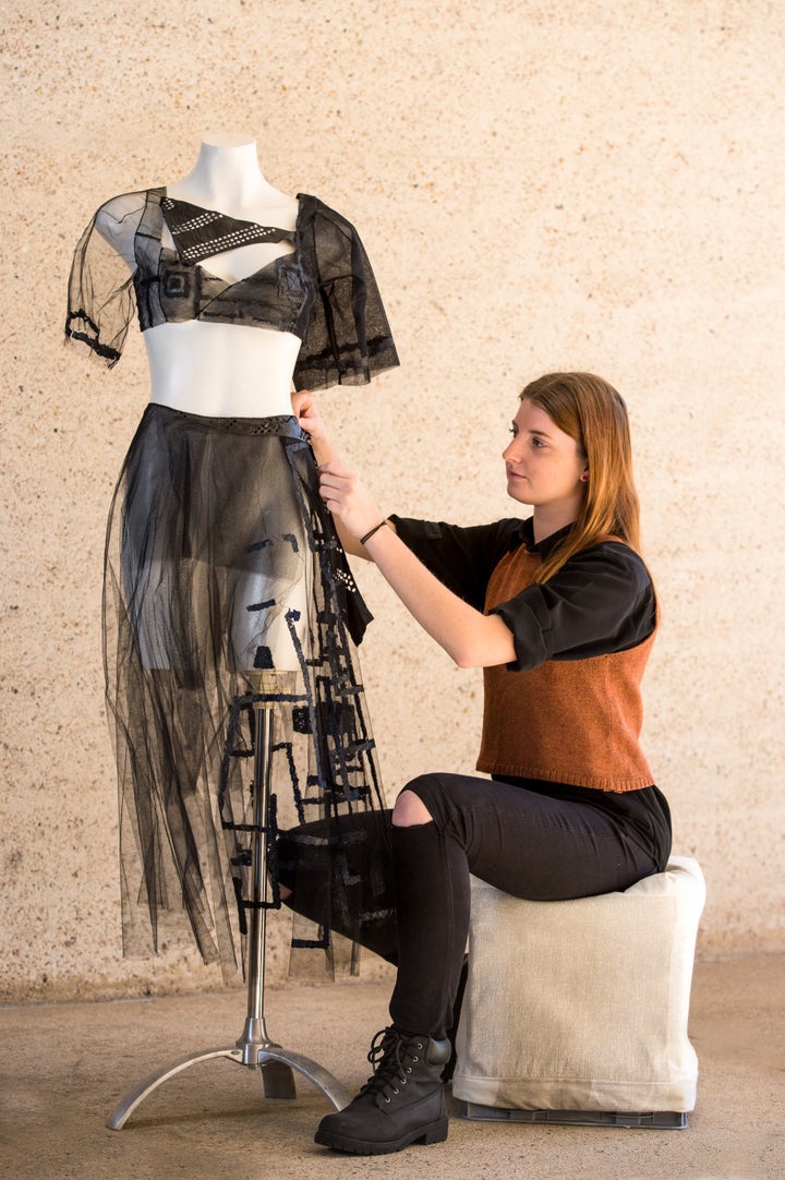 Alexandra Bell, Bachelor of Fashion Design student, with one of her designs incorporating Kombucha.