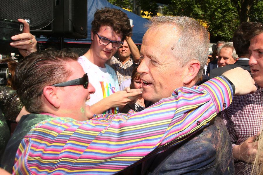 Melbourne, Australia - November 15: Leader of the Opposition Bill Shorten is embraced by a member of the crowd -- love is in the air.