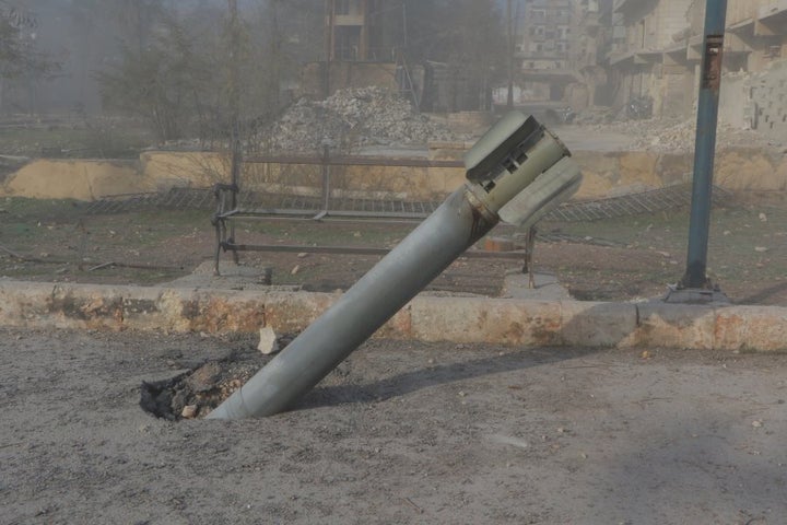 An unexploded missile is seen after warcrafts belonging to Syrian army carried out airstrikes on the opposition controlled areas in Aleppo's Sukkeri region, Syria on December 4, 2016.