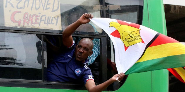 Protesters are celebrating the expected firing of Mugabe.