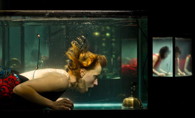 Performer Nanna Bech sings underwater.