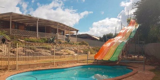 The water slide was built from the parts of an old indoor water park.