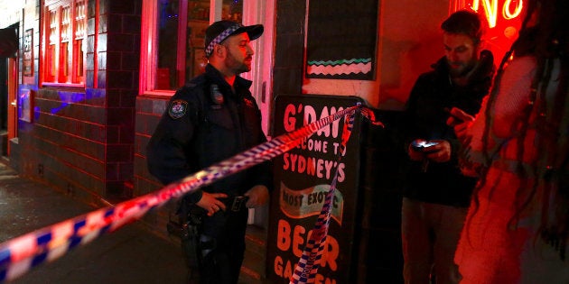 July 29, 2017: A policeman refuses to let members of the public walk onto a Sydney street that has been blocked to the public after a counter-terrorism raid.