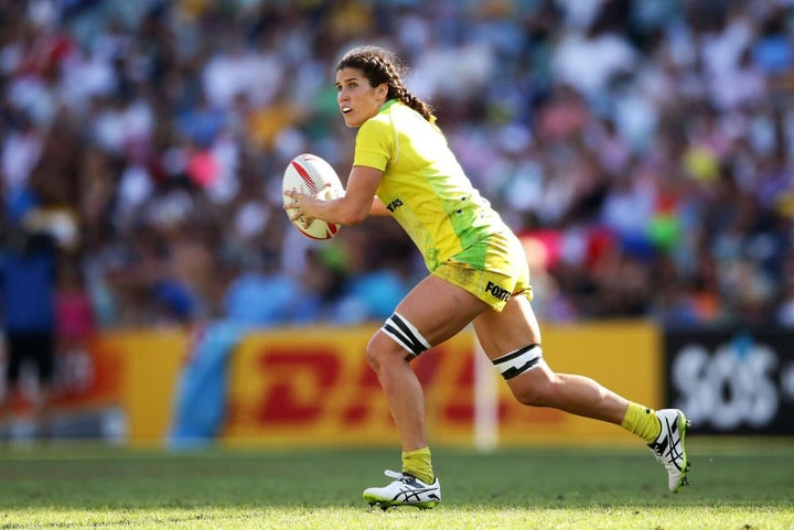 Rugby Sevens player Charlotte Caslick and her partner Lewis