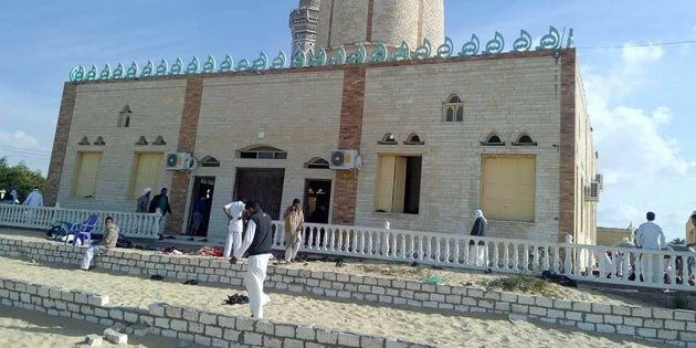 A bomb explosion ripped through the mosque before gunmen opened fire on the people inside.