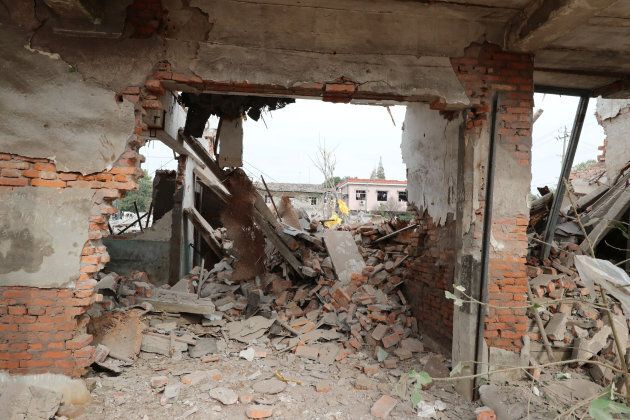 A damaged wall is seen at the site of a blast in Ningbo, Zhejiang province.