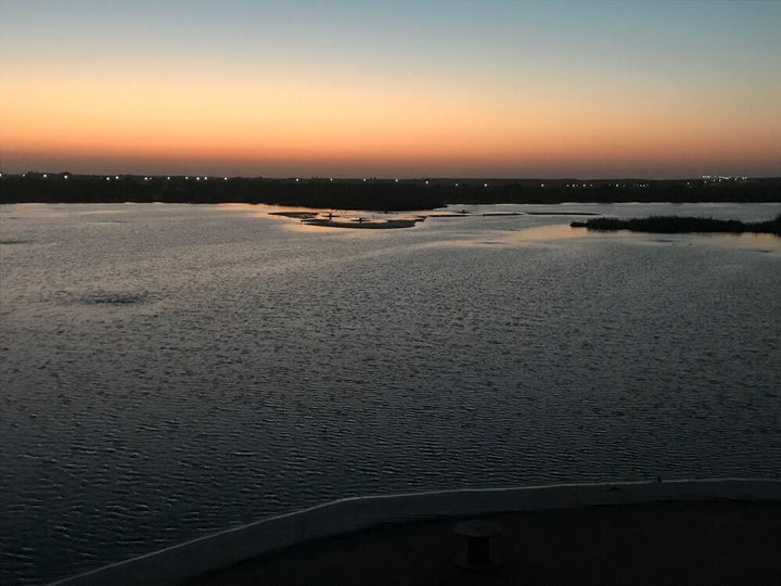 This is what a desert oasis looks like at sunset.