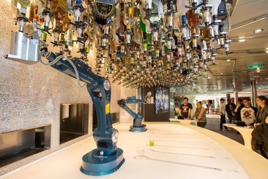 Shaken or stired? A robotic arm can mix drinks a the bar on board Ovation of the Seas.