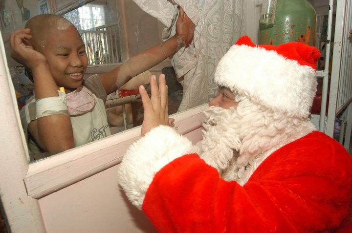 Santas often visit hospitals all around the world.