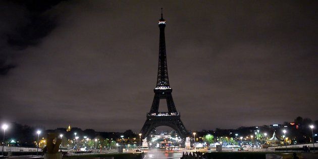 PARIS, FRANCE - NOVEMBER 15: The Eiffel Tower is seen after turned off its lights in respect for the victims of France terror attacks, on November 14, 2015. The Eiffel Tower has been closed indefinitely following the wave of deadly attacks in Paris. 129 people were killed and 352 others injured -- 99 of them in critical condition -- after the terror attacks in Paris on 13 November. (Photo by Dursun Aydemir/Anadolu Agency/Getty Images)