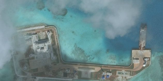 HUGHES REEF, SOUTH CHINA SEA - NOVEMBER 10, 2016: DigitalGlobe closeup imagery of one of the Hughes Reefs. The Hughes Reef is located in the Union banks area within the Spratly group of islands in the South China Sea. Photo DigitalGlobe via Getty Images.