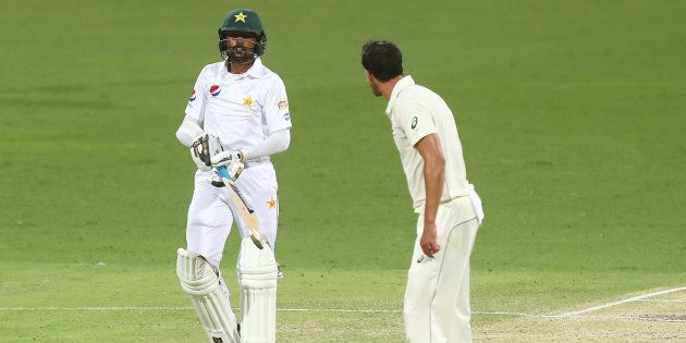 Mitchell Starc politely asks Mohammad Amir whether he likes his tea with milk.