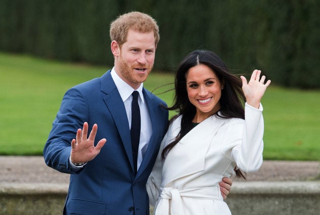 Prince Harry and Meghan Markle attend a photocall in the Sunken Gardens at Kensington Palace following the announcement of their engagement on Nov. 27, 2017 in London.