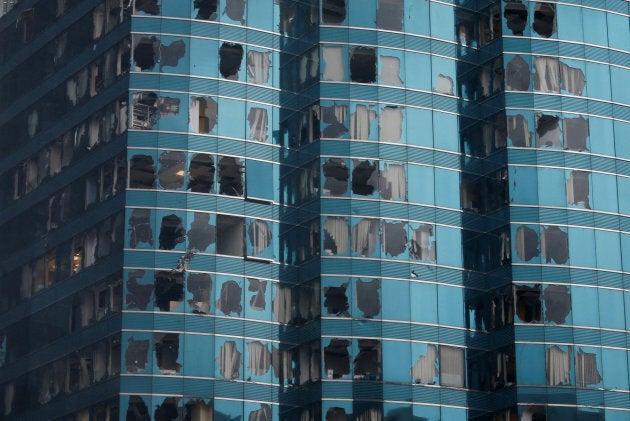 Damaged windows of the One Harbourfront office tower are seen following Typhoon Mangkhut, in Hong Kong.