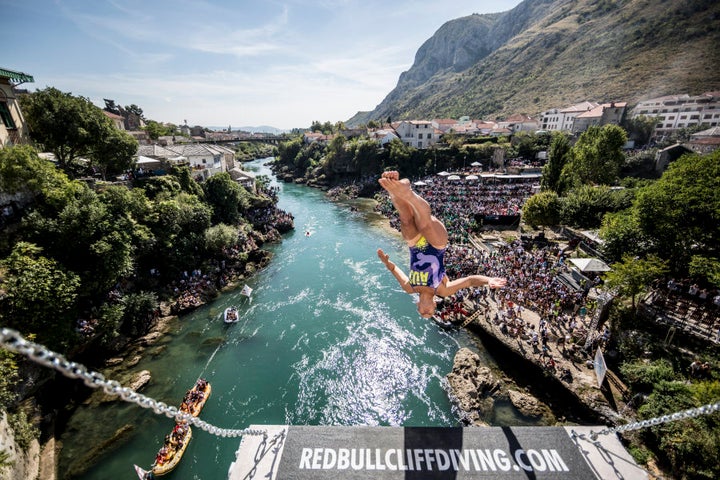 Before diving off cliffs for a living, this Aussie champion was an acrobat on a cruise ship.