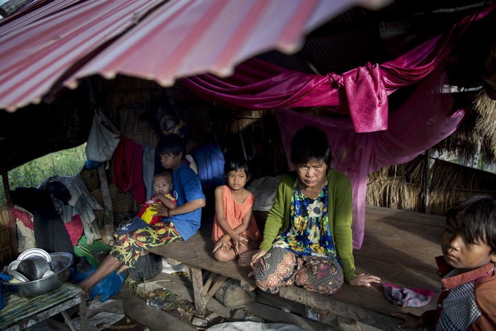 Thol with her children before her sight was restored